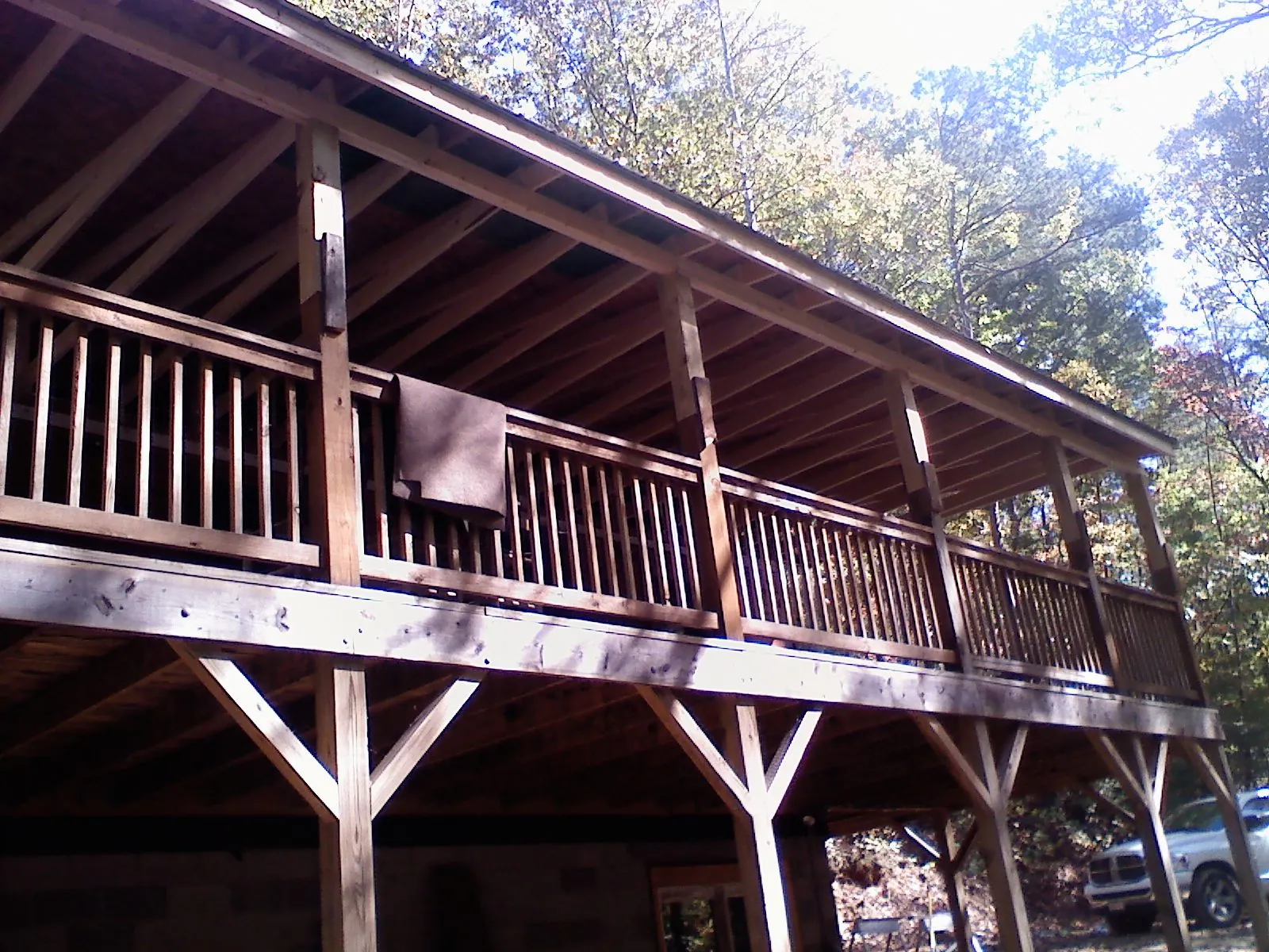 Timber framing under a new elevated porch and deck — Roof Leak Repair in Sayville by Roofing Brothers
